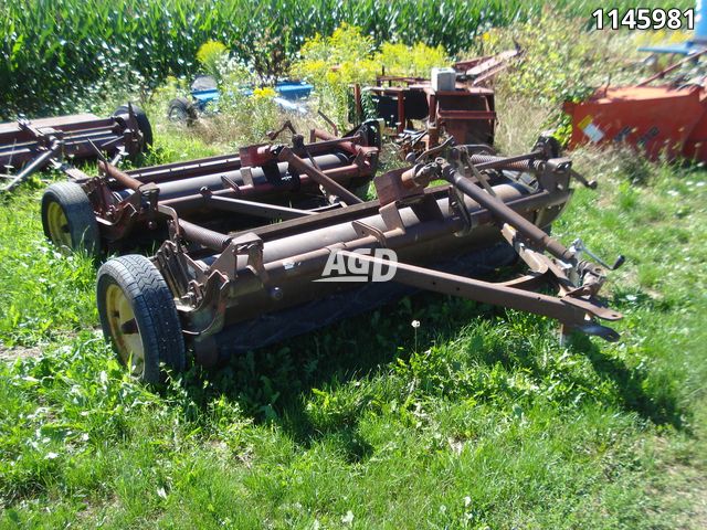 Hay/Forage/Livestock  New Holland 404 Hay Conditioner Photo