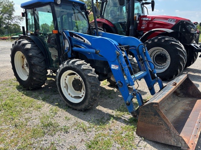 Tractors  New Holland  TN70DA Tractor & Loader Photo