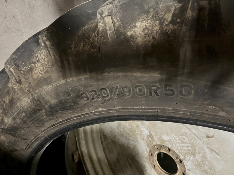 2006 TITAN TIRE AND 2 RIM PACKAGE