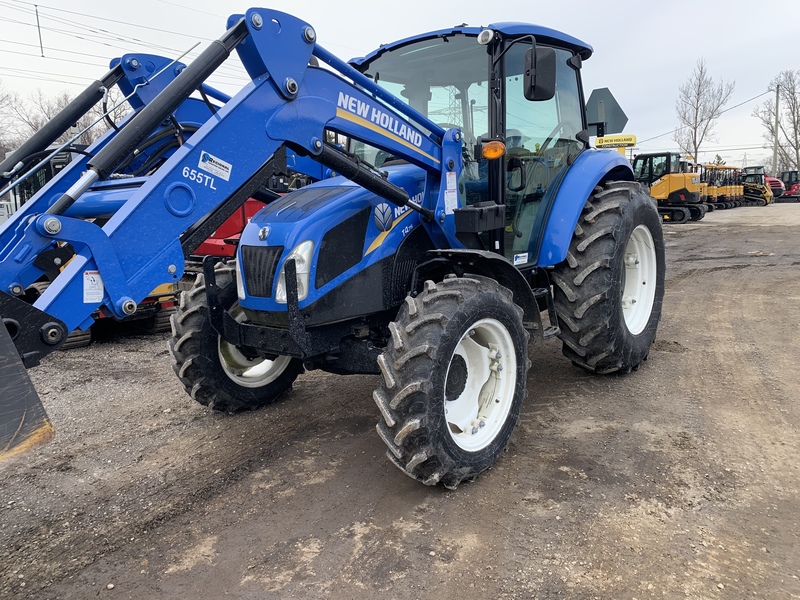 New Holland Loader Tractor and Hay Equipment Package 