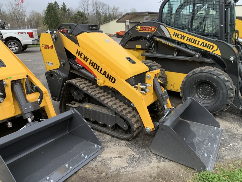 New Holland C314 Stand on skid steer 