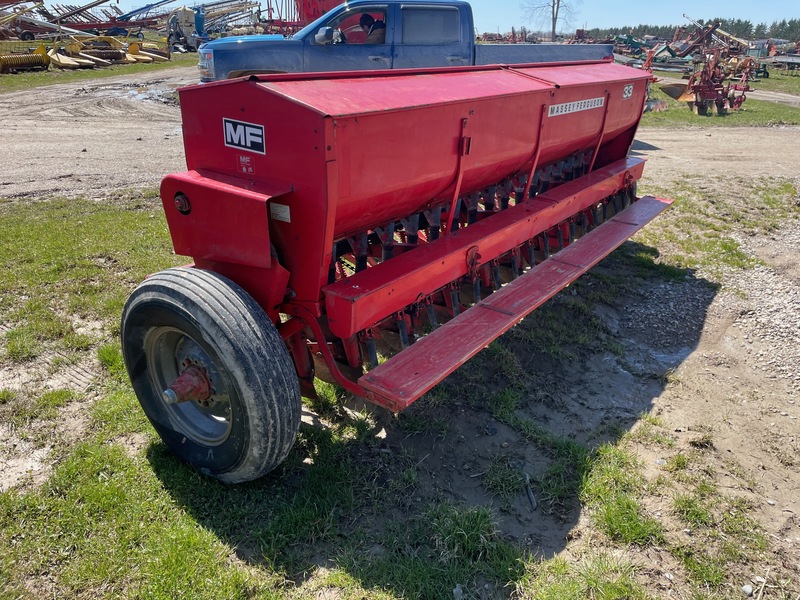Tillage - Other  Massey Ferguson 33 - 17 Row C-Drill Grass Fertilizer - Single Disc Photo