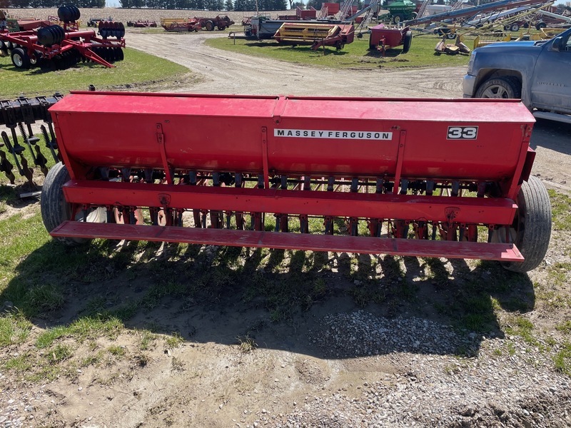 Tillage - Other  Massey Ferguson 33 - 17 Row C-Drill Grass Fertilizer - Single Disc Photo