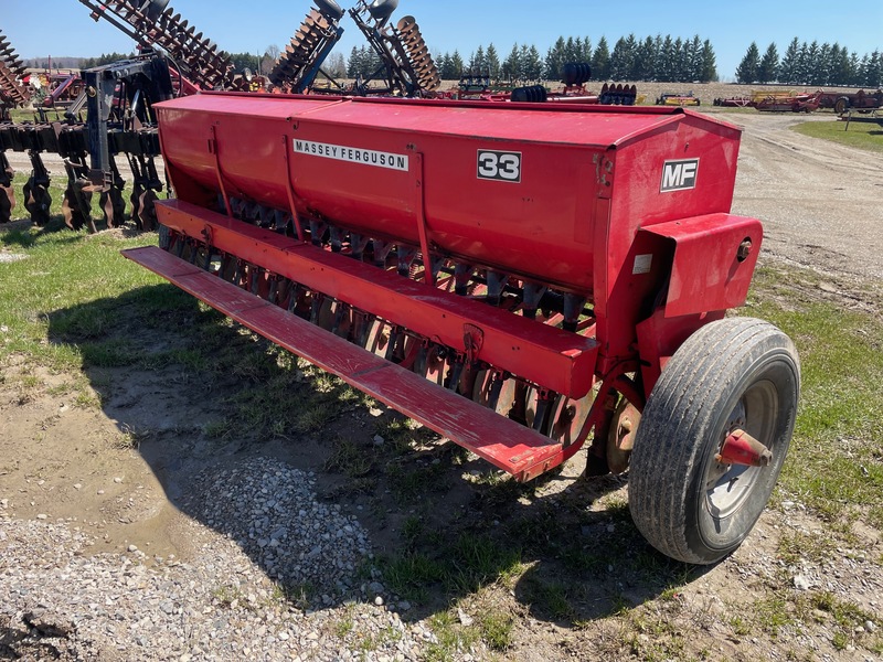 Tillage - Other  Massey Ferguson 33 - 17 Row C-Drill Grass Fertilizer - Single Disc Photo