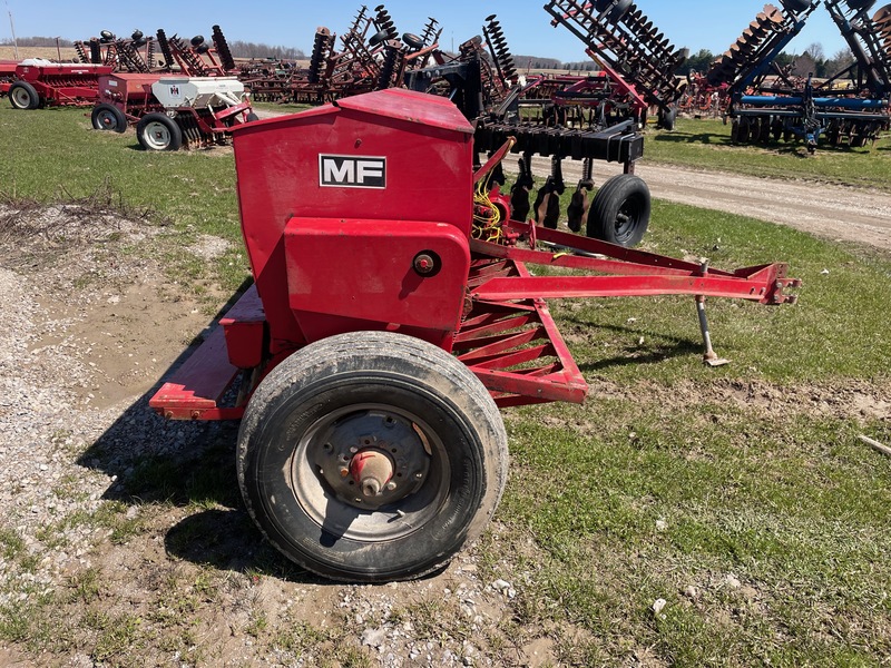 Tillage - Other  Massey Ferguson 33 - 17 Row C-Drill Grass Fertilizer - Single Disc Photo