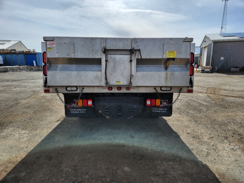 Heavy Trucks  2015 Isuzu NPR HD Dump Truck Photo