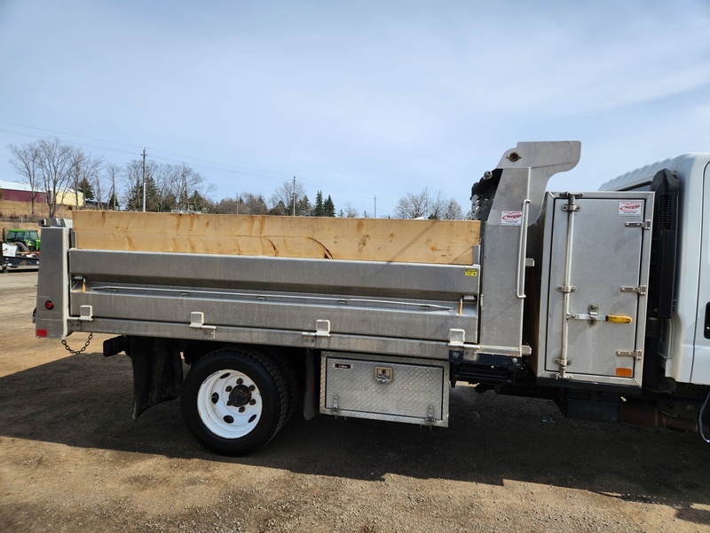 Heavy Trucks  2015 Isuzu NPR HD Dump Truck Photo