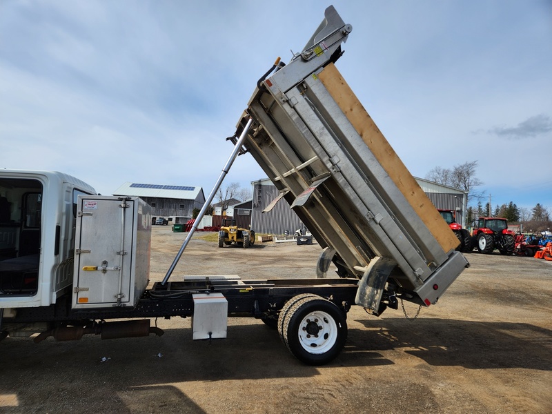 Heavy Trucks  2015 Isuzu NPR HD Dump Truck Photo