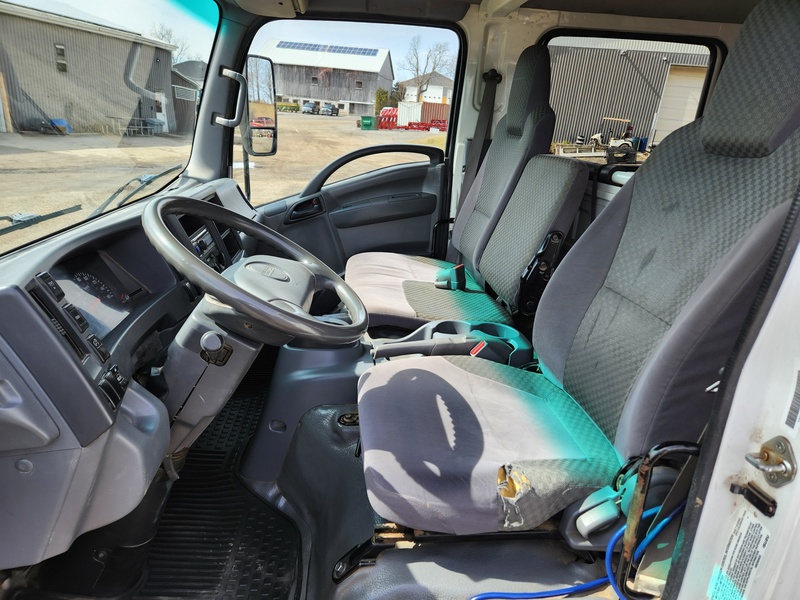Heavy Trucks  2015 Isuzu NPR HD Dump Truck Photo