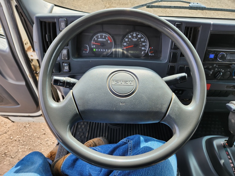 Heavy Trucks  2015 Isuzu NPR HD Dump Truck Photo