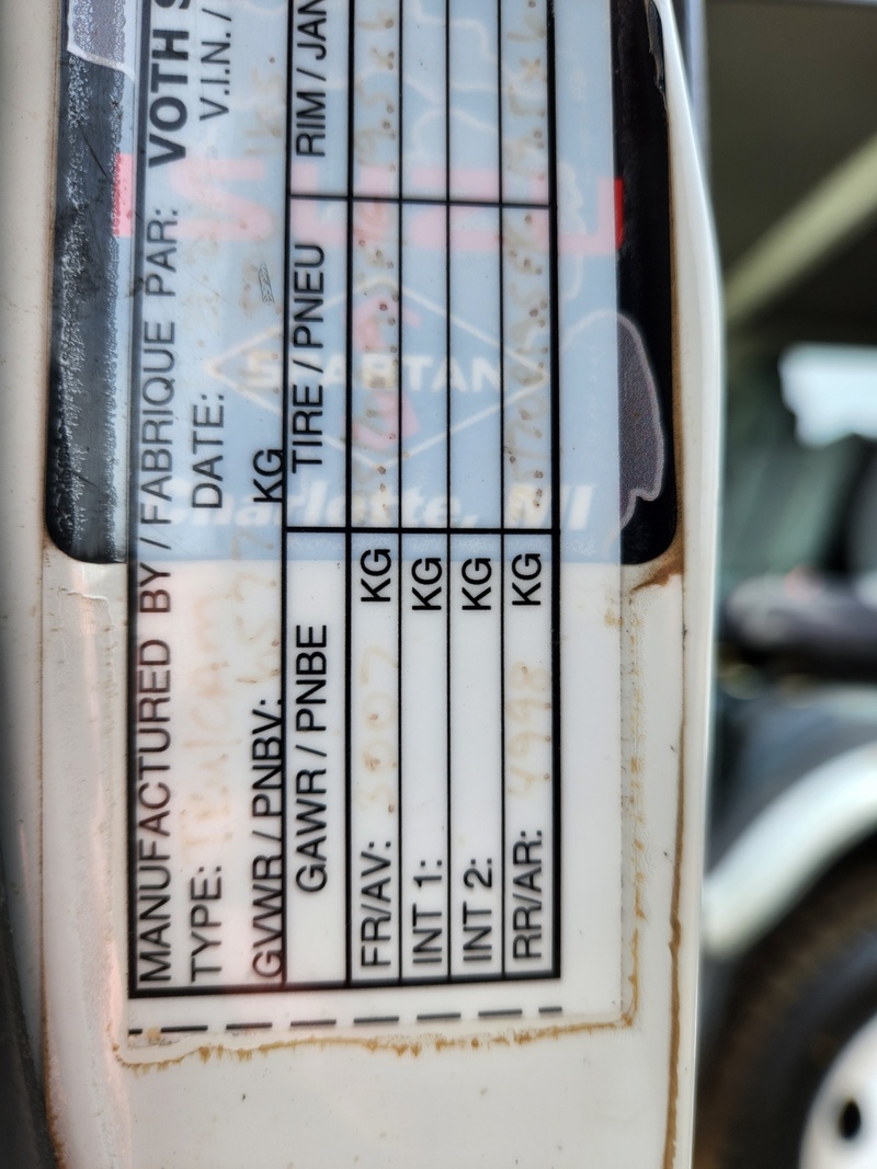 Heavy Trucks  2015 Isuzu NPR HD Dump Truck Photo