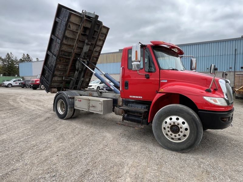 International 4300 Roll off truck with 3 bins package 