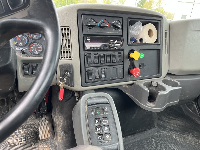 International 4300 Roll off truck with 3 bins package 