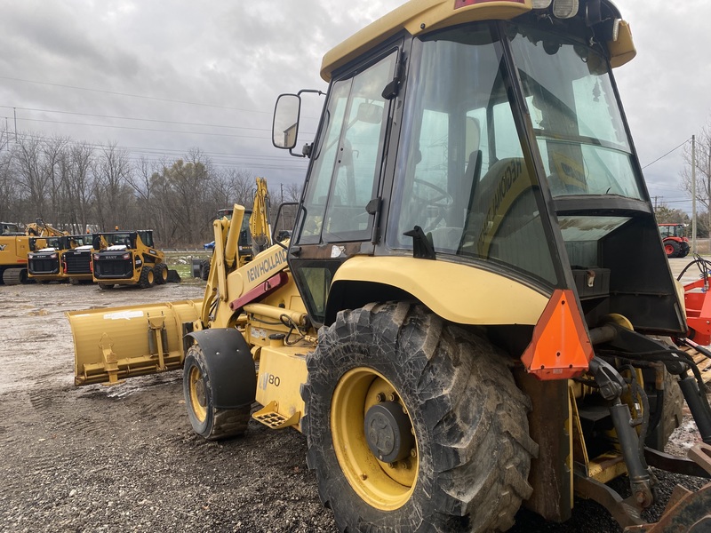 New Holland LV80 Industrial Tractor Loader w/plow