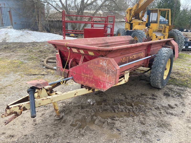 Manure Equipment  Manure Spreader - New Holland 328 Photo