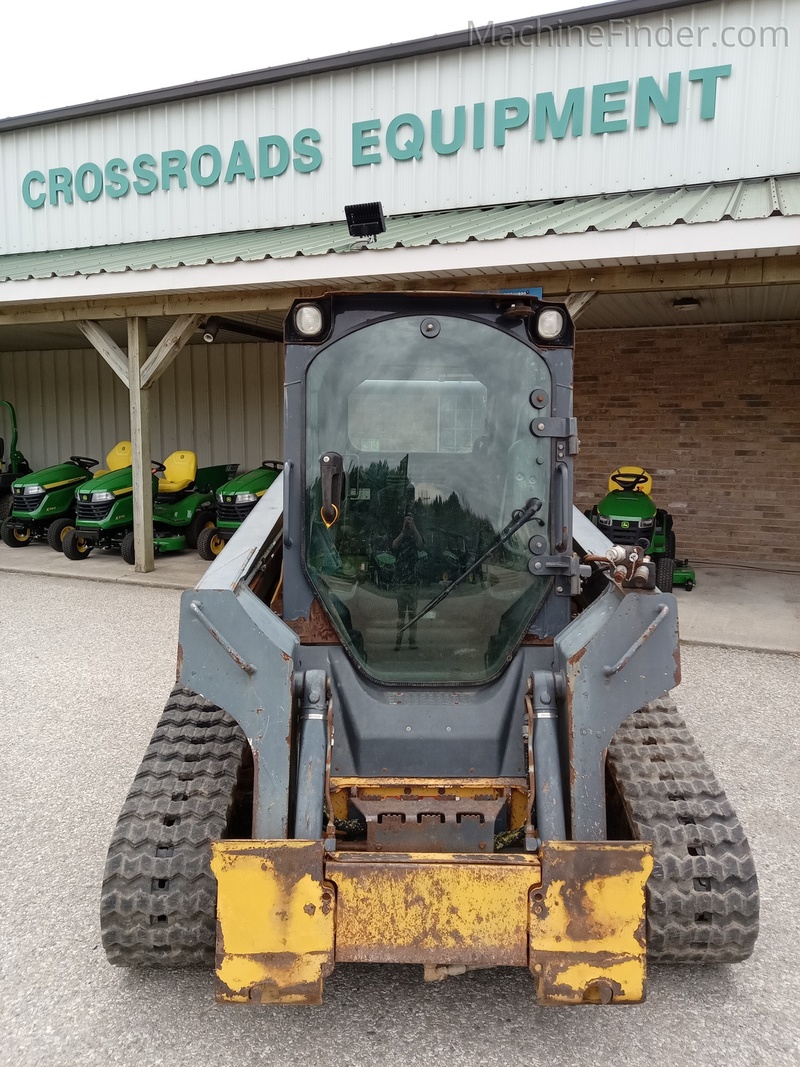 Tractors  2013 John Deere 323D Photo