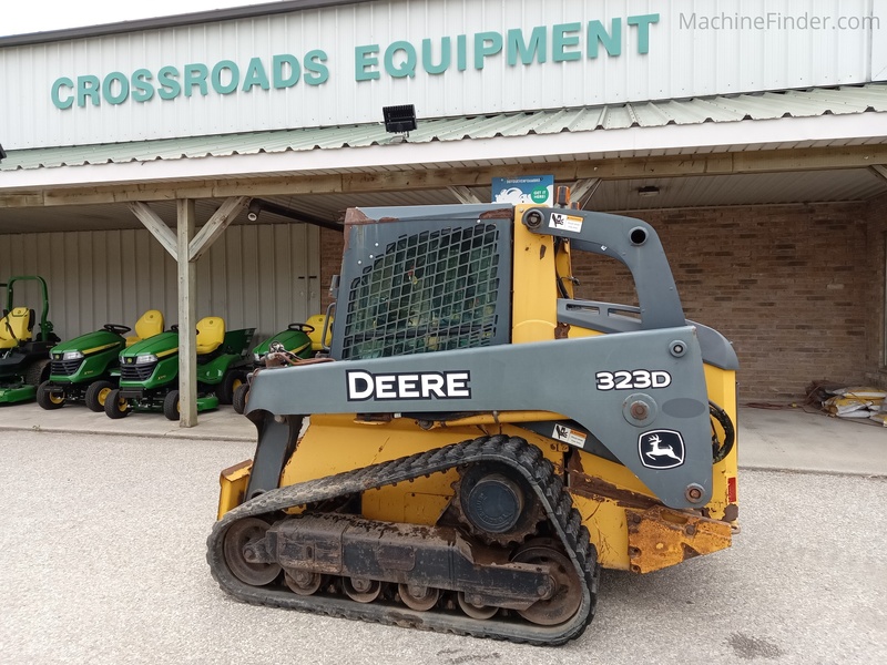 Tractors  2013 John Deere 323D Photo