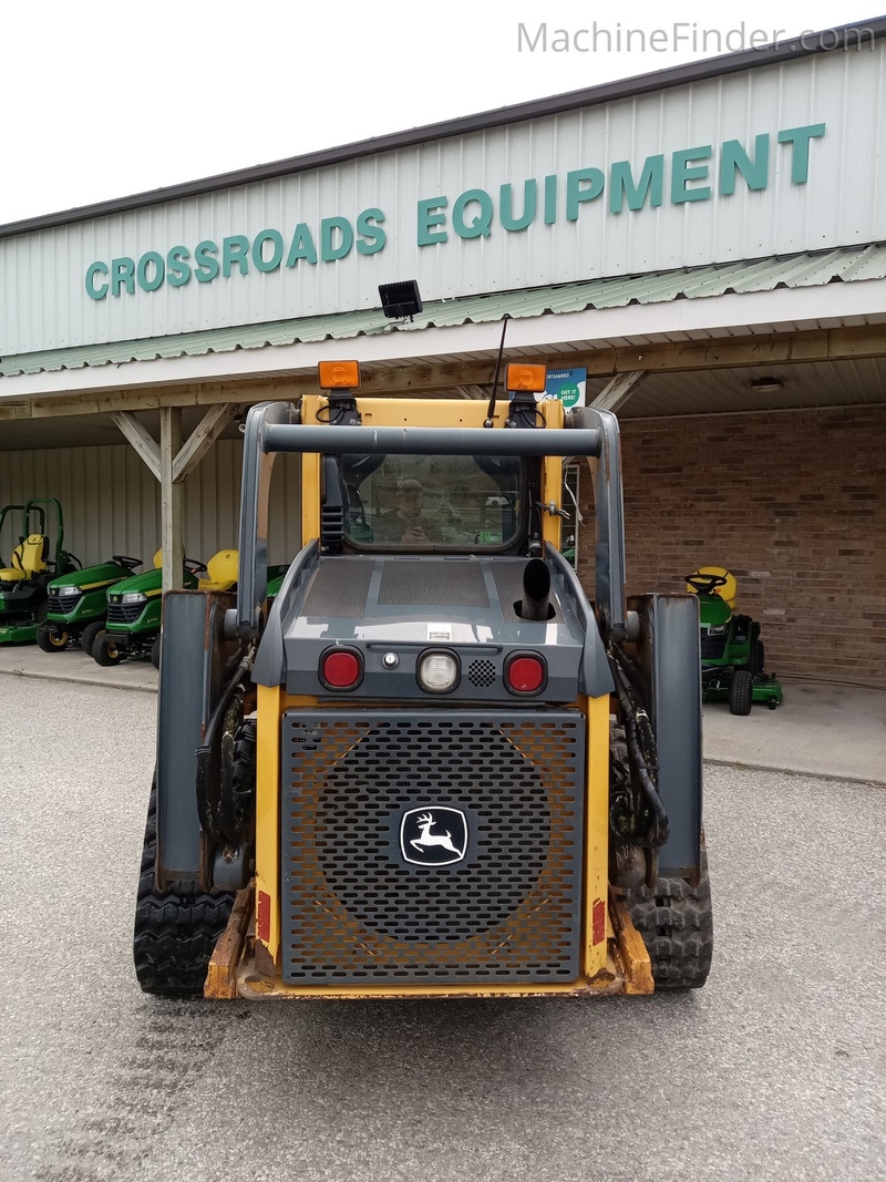 Tractors  2013 John Deere 323D Photo