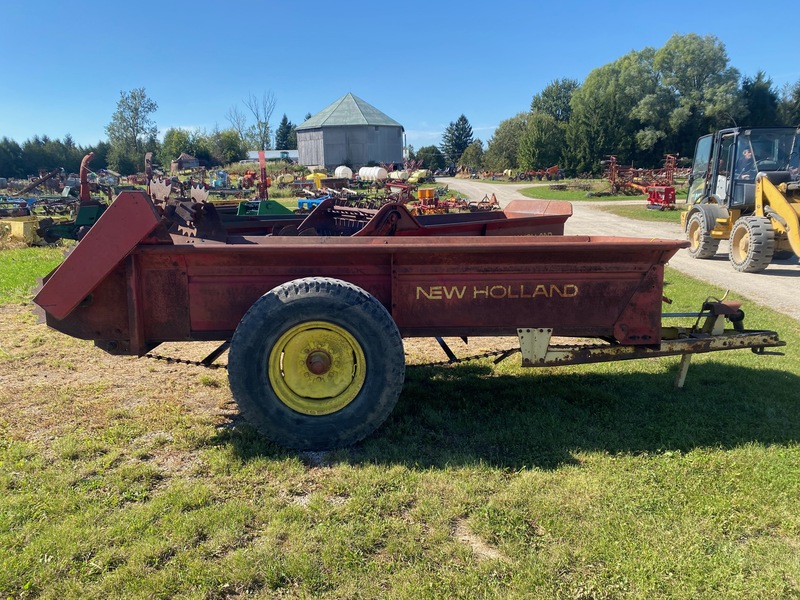 Manure Equipment  New Holland 328 Manure Spreader Photo